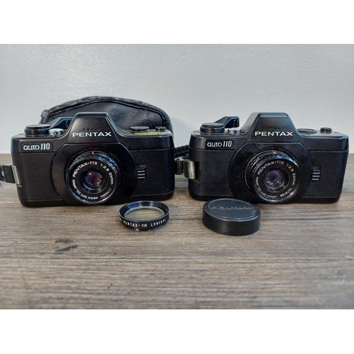 48 - Two Asahi Pentax Auto 110 SLR cameras for 110 film fitted with 1:2.8 24mm lenses, one cased and one ... 