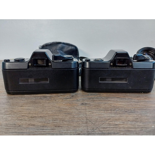 48 - Two Asahi Pentax Auto 110 SLR cameras for 110 film fitted with 1:2.8 24mm lenses, one cased and one ... 