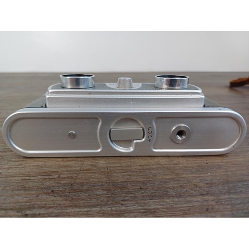 49 - A part cased late 1950s Wray Stereo Graphic 35mm stereo camera fitted with Wray f/4 35mm lenses (ori... 