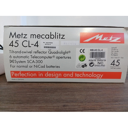 51 - A boxed Metz Mecablitz 45 CL-4 digital handle-mount hammerhead flash