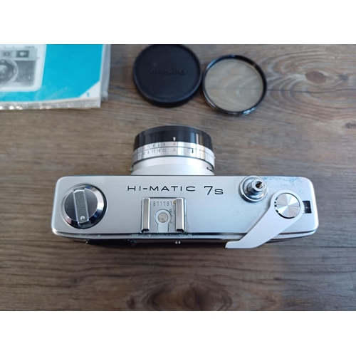 52 - A boxed and cased mid/late 1960s Minolta Hi-Matic 7S 35mm rangefinder camera fitted with Rokkor-PF 1... 