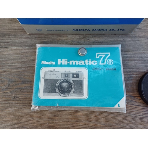 52 - A boxed and cased mid/late 1960s Minolta Hi-Matic 7S 35mm rangefinder camera fitted with Rokkor-PF 1... 