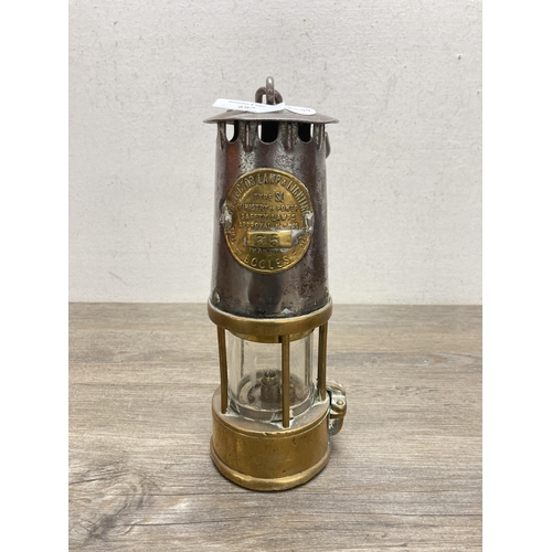 294 - An early 20th century The Protector Lamp & Lighting Co Ltd of Eccles Type SL brass and steel miner's... 