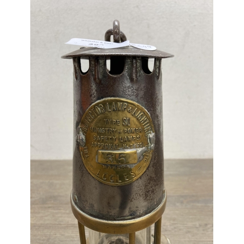 294 - An early 20th century The Protector Lamp & Lighting Co Ltd of Eccles Type SL brass and steel miner's... 