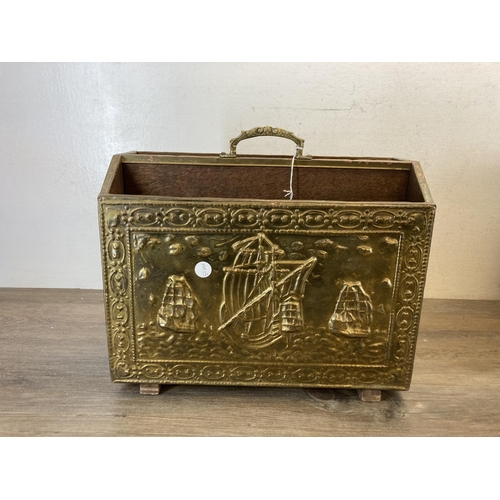 297 - Two pieces of embossed brassware, one magazine rack and one coal box