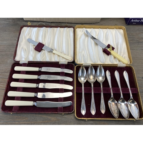 301 - A collection of EPNS and stainless steel cutlery to include boxed set of six Arthur Price steak kniv... 