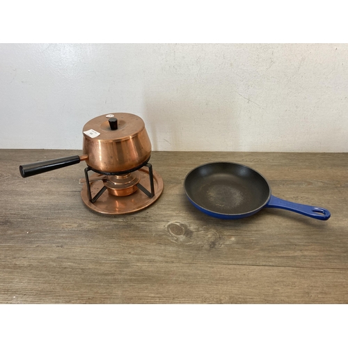 302 - Four pieces of metalware, one Le Creuset blue enamelled cast iron frying pan, one Le Creuset no. 25 ... 