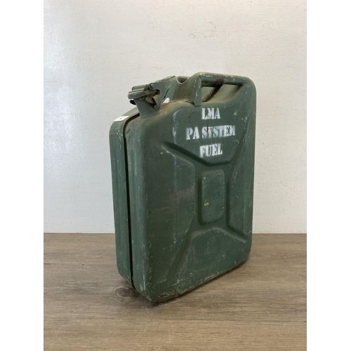 308 - A mid 20th century green painted metal jerry can - approx. 47cm high