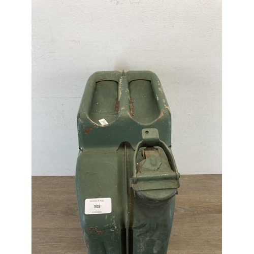 308 - A mid 20th century green painted metal jerry can - approx. 47cm high