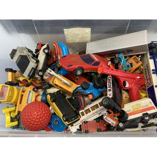 314 - A collection of toys to include 1980s New Bright Morgan TR2 talking robot, Lone Star cap gun, diecas... 