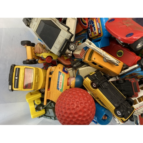 314 - A collection of toys to include 1980s New Bright Morgan TR2 talking robot, Lone Star cap gun, diecas... 