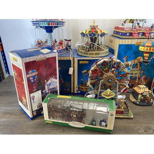 317 - Six boxed Lemax Village Collection display models to include The Cosmic Swing, Le Zinger, Belmont Ca... 