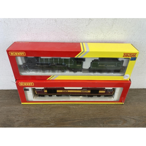 319 - Four boxed Hornby 00 gauge railway models to include R3060 Tornado BR Class A1 locomotive and tender... 