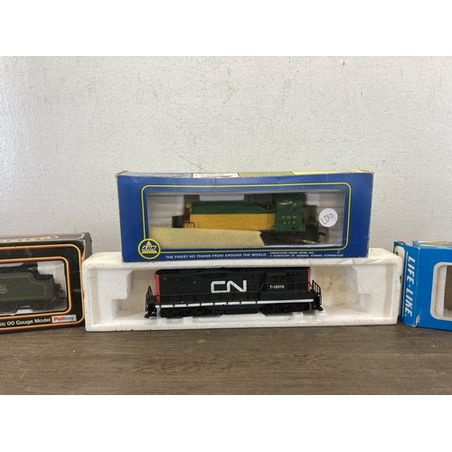 320 - Four model railway items to include AHM END SW-1 locomotive, Life-Like locomotive, Palitoy Mainline ... 