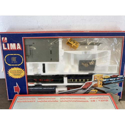 321 - Two boxed Lima Models items, one Via Giovanni Imperiali 77 36100 Vicenza and one automatic car unloa... 