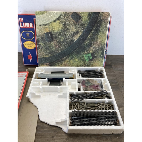 321 - Two boxed Lima Models items, one Via Giovanni Imperiali 77 36100 Vicenza and one automatic car unloa... 