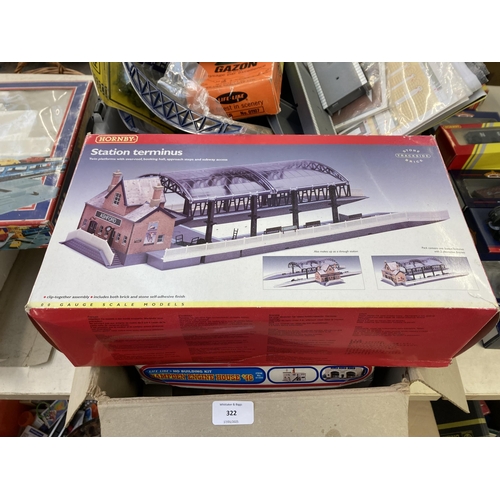 322 - A collection of model railway items to include boxed Hornby station terminus, boxed Life-Like scener... 