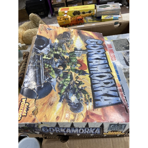 329 - A collection of items to include Games Workshop Gorkamorka, Harry Potter trading card game, McDonald... 