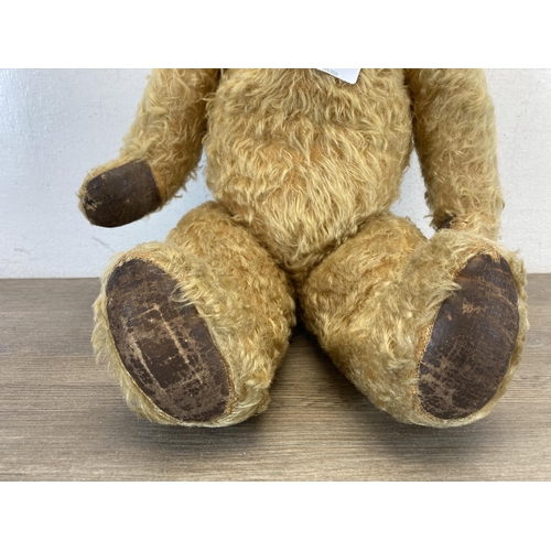 332 - A vintage blonde mohair articulated teddy bear - approx. 53cm high