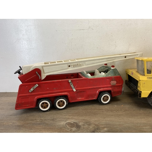 337 - Two vintage Tonka model vehicles, one crane and one fire truck