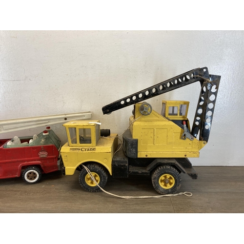 337 - Two vintage Tonka model vehicles, one crane and one fire truck