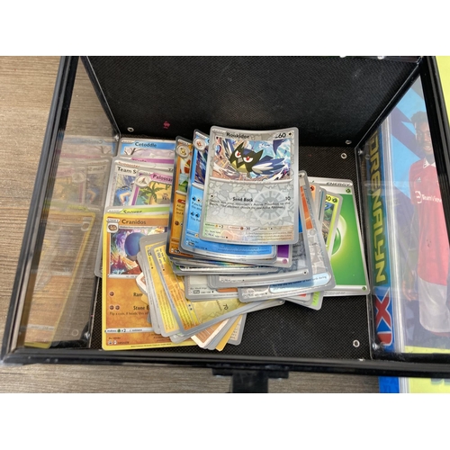 338 - A collection of trading cards to include Pokémon, Panini Premier League, Panini Mulch Mayhem Bin Wea... 