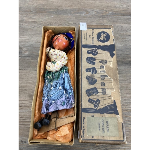 344 - A vintage boxed Pelham Puppets Ltd. wooden puppet