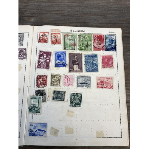 402 - Seven albums containing worldwide stamps