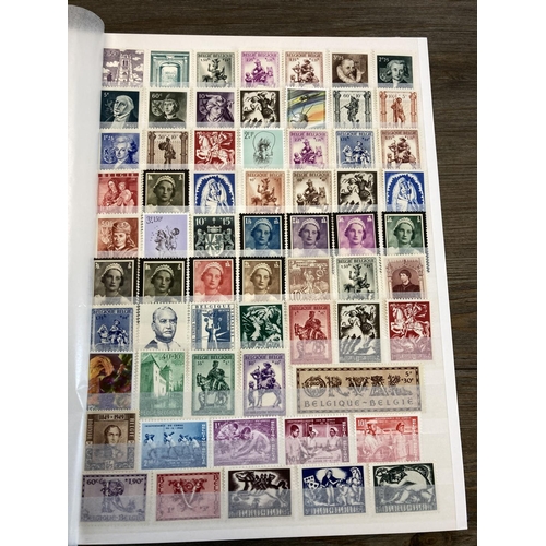 405 - Seven albums containing worldwide stamps