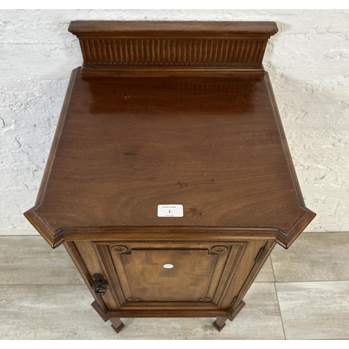 1 - An Edwardian mahogany bedside cabinet on tapering supports - approx. 87cm high x 44cm wide x 41cm de... 