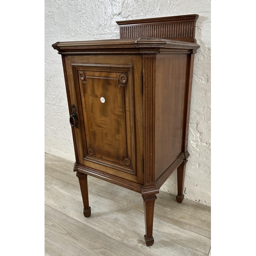 1 - An Edwardian mahogany bedside cabinet on tapering supports - approx. 87cm high x 44cm wide x 41cm de... 