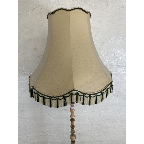 12 - A mid 20th century onyx and gilt metal standard lamp with shade - approx. 164cm high including shade