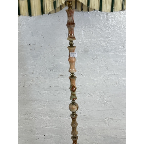 12 - A mid 20th century onyx and gilt metal standard lamp with shade - approx. 164cm high including shade