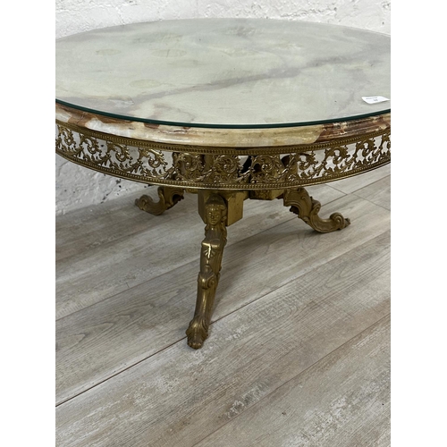 13 - A Rococo style onyx and gilt metal circular tripod pedestal coffee table with glass top - approx. 46... 