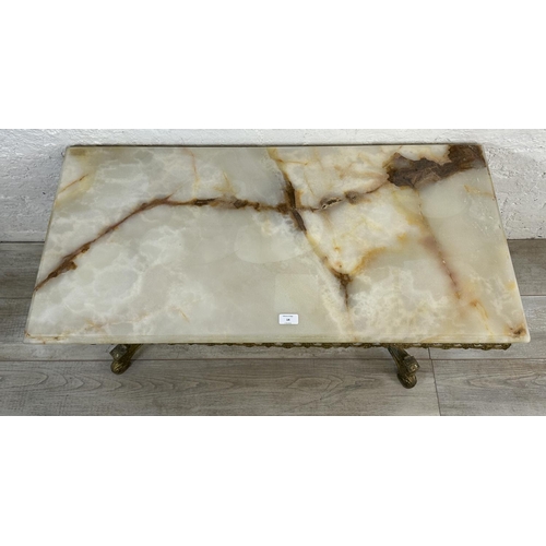 14 - A Rococo style onyx and gilt metal rectangular twin pedestal coffee table - approx. 46cm high x 50cm... 