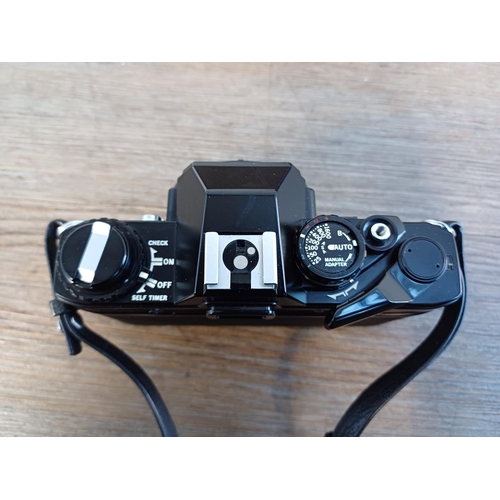 58 - Six boxed Olympus OM system items, one black OM10 35mm SLR body, one Zuiko MC Auto-S 1:1.8 f=50mm le... 