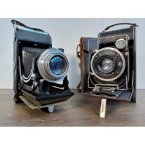 63 - Two Zeiss Ikon folding viewfinder cameras, one cased Cocarette 522/17 for 8x10.5cm images on 122 fil... 