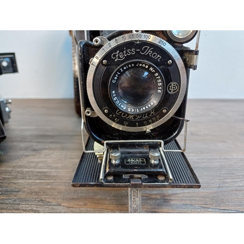 63 - Two Zeiss Ikon folding viewfinder cameras, one cased Cocarette 522/17 for 8x10.5cm images on 122 fil... 