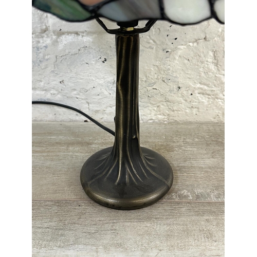 147 - A Tiffany style stained glass and bronzed effect table lamp - approx. 40cm high