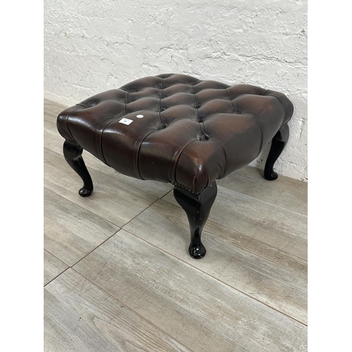 149 - A brown leather Chesterfield footstool on cabriole supports - approx. 34cm high x 56cm wide x 56cm d... 