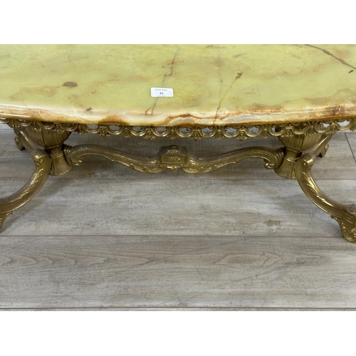 15 - A Rococo style onyx and gilt metal oval twin pedestal coffee table - approx. 45cm high x 50cm wide x... 