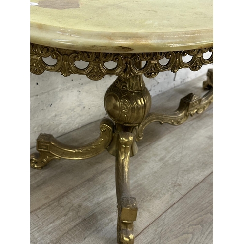 15 - A Rococo style onyx and gilt metal oval twin pedestal coffee table - approx. 45cm high x 50cm wide x... 