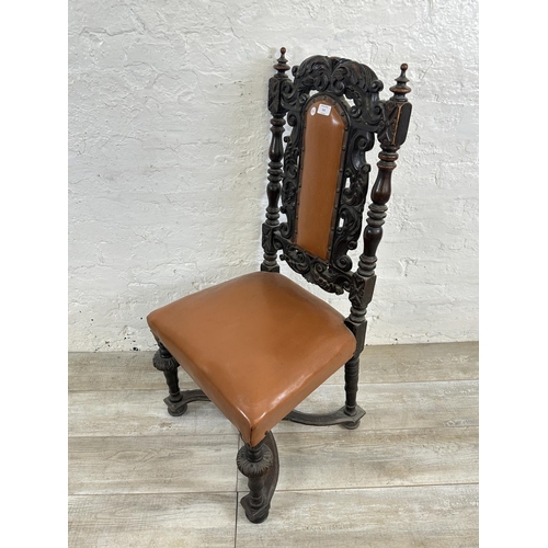 153 - A 19th century carved oak and tan vinyl upholstered dining chair