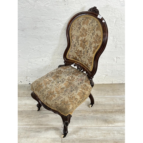 155 - A Victorian carved rosewood and floral fabric upholstered bedroom chair - approx. 96cm high x 48cm w... 