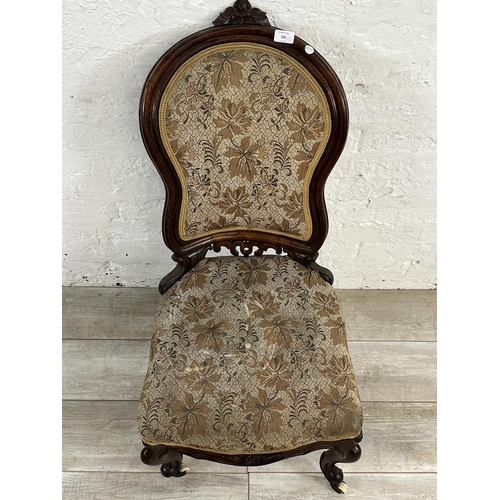 155 - A Victorian carved rosewood and floral fabric upholstered bedroom chair - approx. 96cm high x 48cm w... 