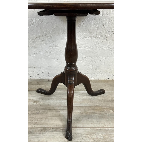 156 - A George III oak circular tilt top tripod pedestal occasional table - approx. 70cm high x 74cm diame... 