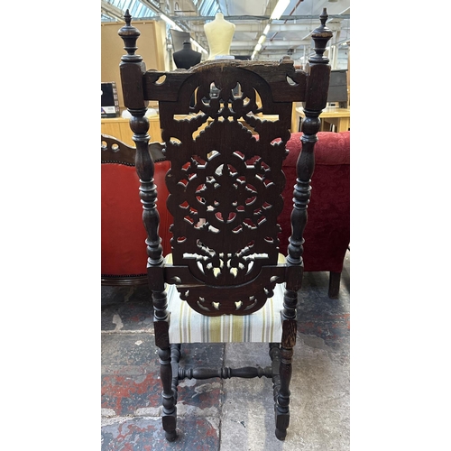 157 - A 19th century carved oak and fabric upholstered dining chair