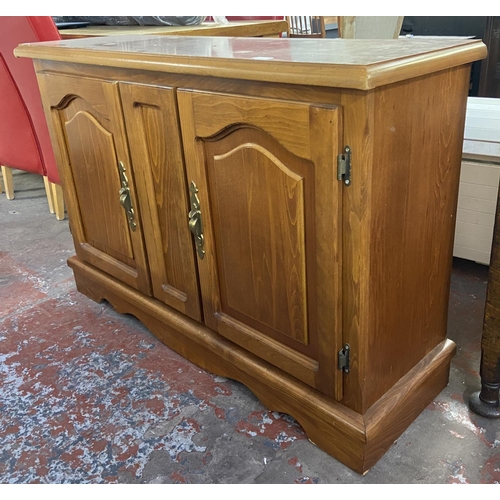 165 - A modern beech effect sideboard - approx. 80cm high x 120cm wide x 39cm deep