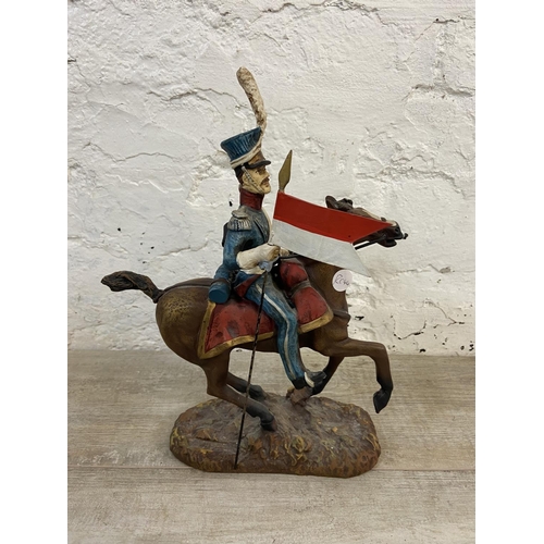 167 - A hand painted plaster Polish Cavalry Lancer on horse figurine - approx. 34cm high