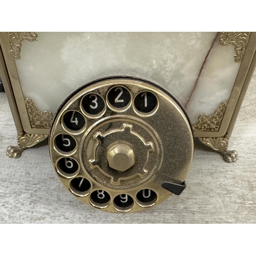 17 - Fifteen onyx and gilt metal items to include rotary dial telephone, jewellery box, table lighters, p... 